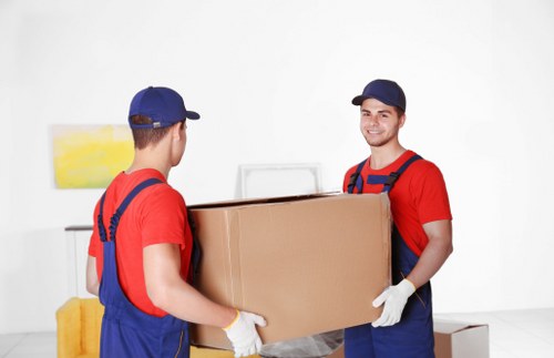 Storage team sorting recyclable materials at a Barbican facility