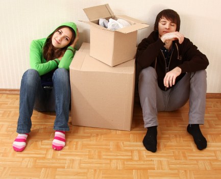Professional movers loading furniture during Barbican house removals