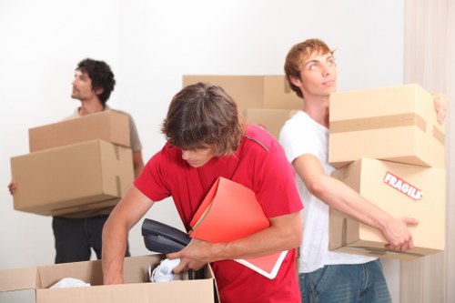 Measuring boxes and furniture for a Barbican storage estimate