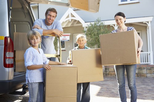 Packing furniture and fragile items for a Barbican move
